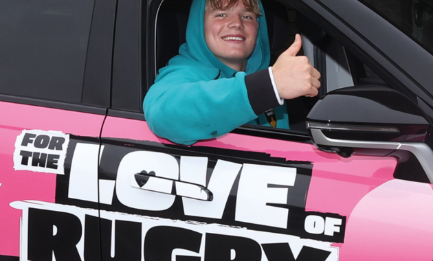 Person at JAECOO carfest activation in pink car - Dig & Dig