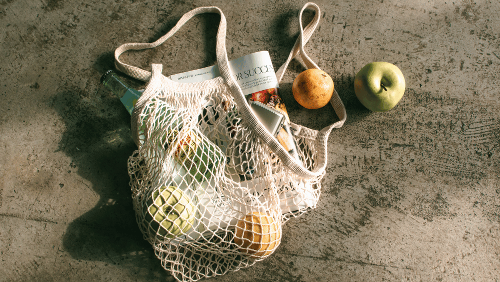Basket bag on the floor with products spilling out - Dig & Dig