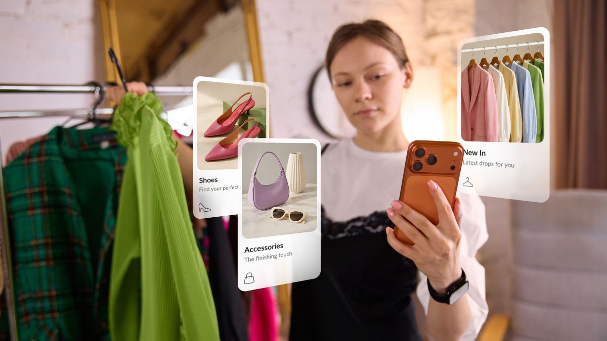 Young woman looking at phone browsing ecommerce options showing as a result of black friday AI search optimisation - Dig & Dig